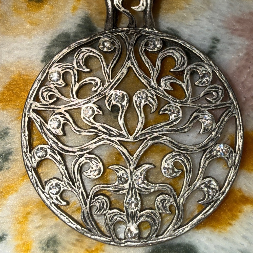 Ornate Filigree Crystal Pendant - Silver Tone with Yellow Backing